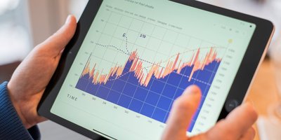 Person holding a tablet